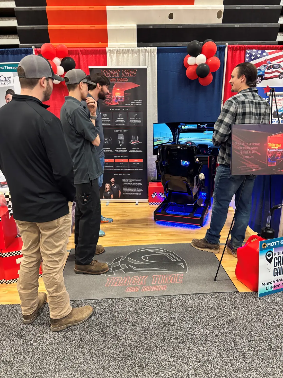 A Track Time simulator in an exhibitor booth at a trade show